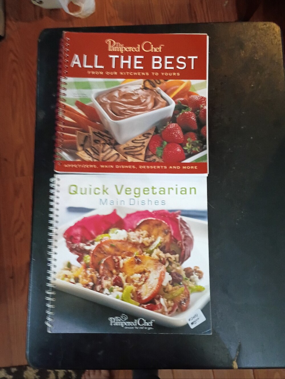 The Pampered Chef red and white cookbook duo